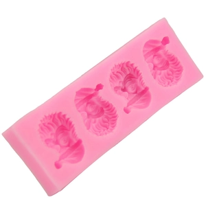 Pink silicone Santa Claus mold with four cavities for fondant, chocolate and baking DIY