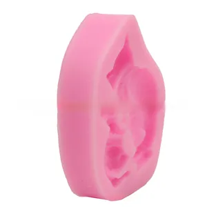 Detailed pink silicone mold for DIY baking and crafts featuring intricate cat relief pattern