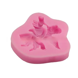 Macro shot of pink silicone angel mold showing intricate detail for baking and DIY crafts