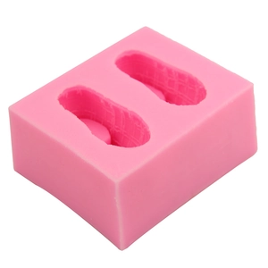 Moule en silicone rose pour chaussures de bébé en fondant avec texture tricotée