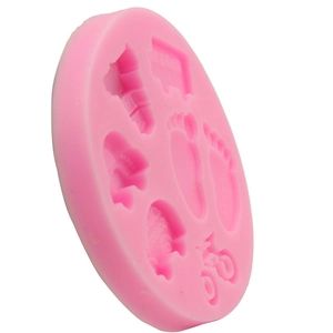 Pink silicone mold with baby footprints and car patterns for cake DIY baking projects