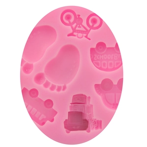 Pink silicone mold with car, bicycle and foot shapes for DIY fondant and baking