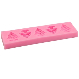 Pink silicone mold featuring five 3D Christmas tree and angel shapes for DIY baking