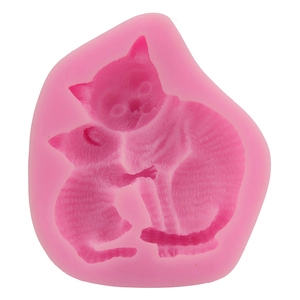 Pink silicone mold featuring two cuddling cats for DIY fondant and baking projects