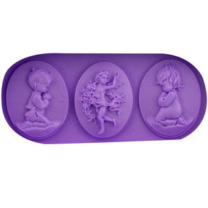 Purple silicone mold with embossed designs of praying boy, angel, and girl for DIY baking