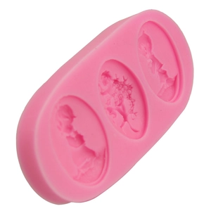 Pink silicone mold featuring three oval slots with vintage relief portrait figures