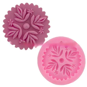 Detailed macro view of pink silicone leaf mold with embossed floral vein textures