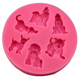 Pink silicone mold featuring five different cute dog breeds for DIY cake baking and crafts
