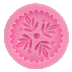 Pink round silicone leaf mold for fondant baking with maple leaf and star patterns