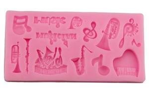 Pink silicone music instrument mold for cake fondant and DIY crafts with piano and notes