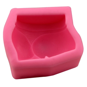 Pink silicone mold featuring human lower body shape for DIY candles and handmade soap making