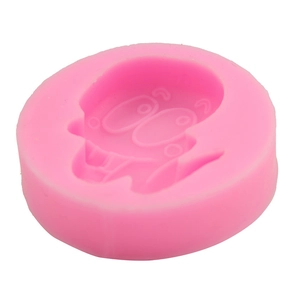 Pink silicone cartoon snake mold for DIY cake baking and soap making on white background