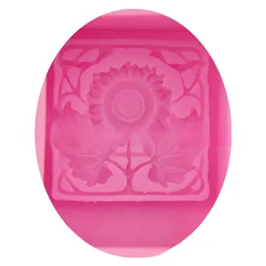 Detailed view of pink silicone sunflower mold showing intricate floral textures and patterns