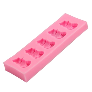 Pink 5-cavity silicone snowman mold for chocolate and fondant cake decoration