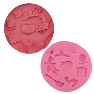 Pink silicone mold detail showing witch hat, broom, and magic spell book patterns