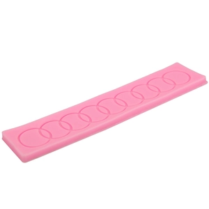Pink silicone fondant mold with continuous interlocking ring texture for cake DIY