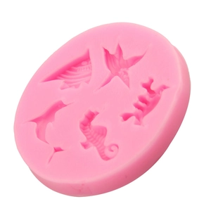Rosa Silikonform mit Meerestieren für Fondant mit Seestern-, Seepferdchen- und Delfinform