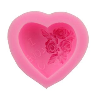 Pink heart-shaped silicone cake mold with rose patterns and I Love U text
