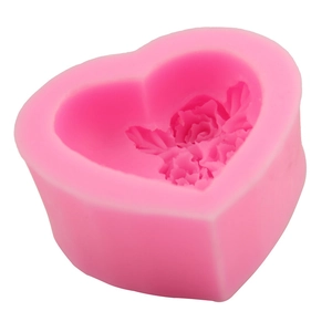 Pink heart-shaped silicone mold with detailed rose flower texture for DIY baking