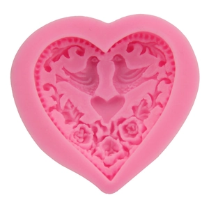 Pink heart silicone mold with embossed bird and rose patterns for DIY cake baking