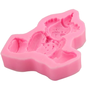 Pink silicone clown mold for DIY cake fondant chocolate and soap making on white background