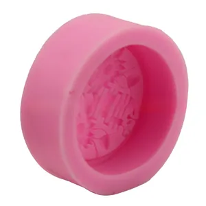 Detailed macro view of pink silicone mold with embossed flower and Xi character pattern