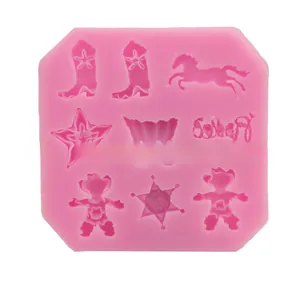 Pink silicone mold featuring cowboy boots, horse, and sheriff badge for fondant and DIY crafts