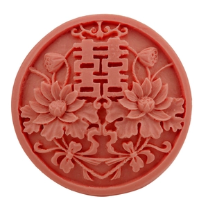Pink round silicone fondant mold with Double Happiness Xi and lotus flower relief