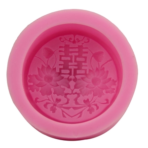 Pink silicone mold for fondant cakes featuring a traditional Double Happiness lotus design