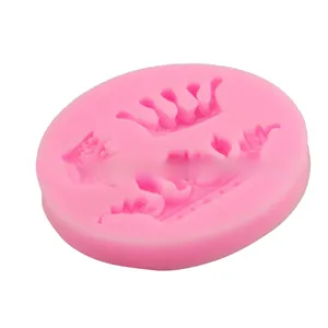 Detailed close-up of pink silicone crown and floral patterns for DIY cake fondant molds