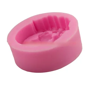 Detailed view of pink silicone mold with oval shape for DIY soap and candle making