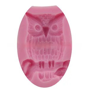 Detailed pink silicone owl mold for fondant cakes and chocolate crafting with owl texture