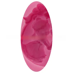 Detailed pink silicone mold featuring a small girl figure for cake fondant and soap making