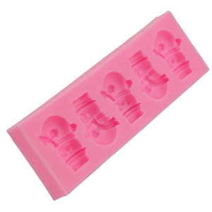 Pink rectangular silicone mold with four snowman cavities for baking and DIY crafts