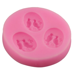 Pink round silicone mold with three 3D pairs of birds for fondant and chocolate cake decor