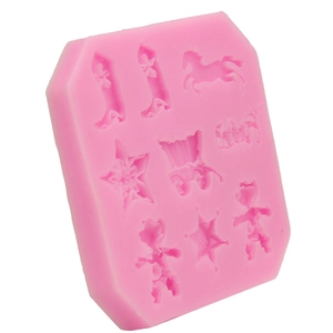 Pink silicone fondant mold featuring star boot and horse shapes for DIY cake decorating