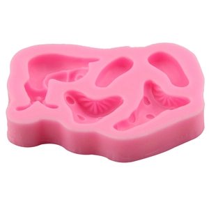 Pink silicone snail and mushroom fondant mold for cake decorating and chocolate