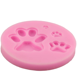 Pink silicone paw print mold for DIY cake decorating and chocolate baking