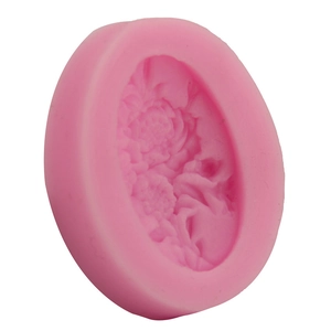 Pink silicone fondant mold featuring intricate 3D peony flower patterns for DIY cake baking