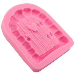Pink silicone fairy door mold with heart motif for fondant cakes and chocolate decorating