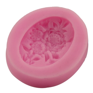 Pink silicone mold for DIY flower cakes with detailed sunflower embossed design