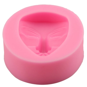 Pink silicone mold with V-shaped face mask design for fondant and DIY crafts
