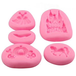 5-piece pink silicone mold set featuring fairy tale castle, pumpkin carriage, and princess dress