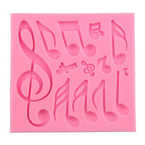Pink silicone music note mold for fondant cake decoration and chocolate baking