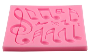 Pink silicone music note fondant mold for musical themed cake decoration and chocolate DIY
