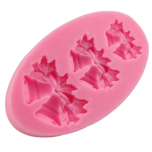 Moule à gâteau en silicone rose avec cloches de Noël et feuilles de houx pour fondant