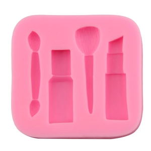 Pink silicone makeup mold featuring lipstick, nail polish, and cosmetic brush shapes