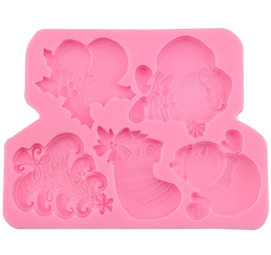 Pink silicone mold featuring Santa Claus, snowman, and Christmas stocking shapes