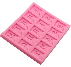 Pink silicone Merry Christmas flag mold for fondant, chocolate and festive cake decorating