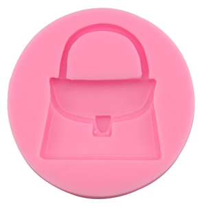 Pink silicone mold featuring a classic handbag shape for fondant or chocolate decoration
